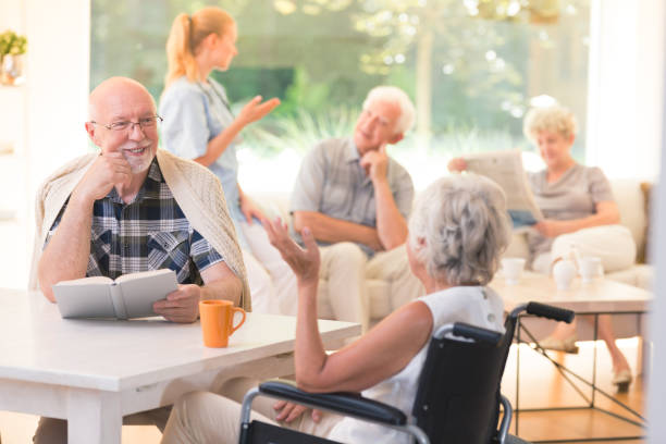 group of seniors hanging out indoors