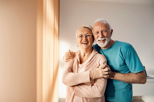 senior couple hugging